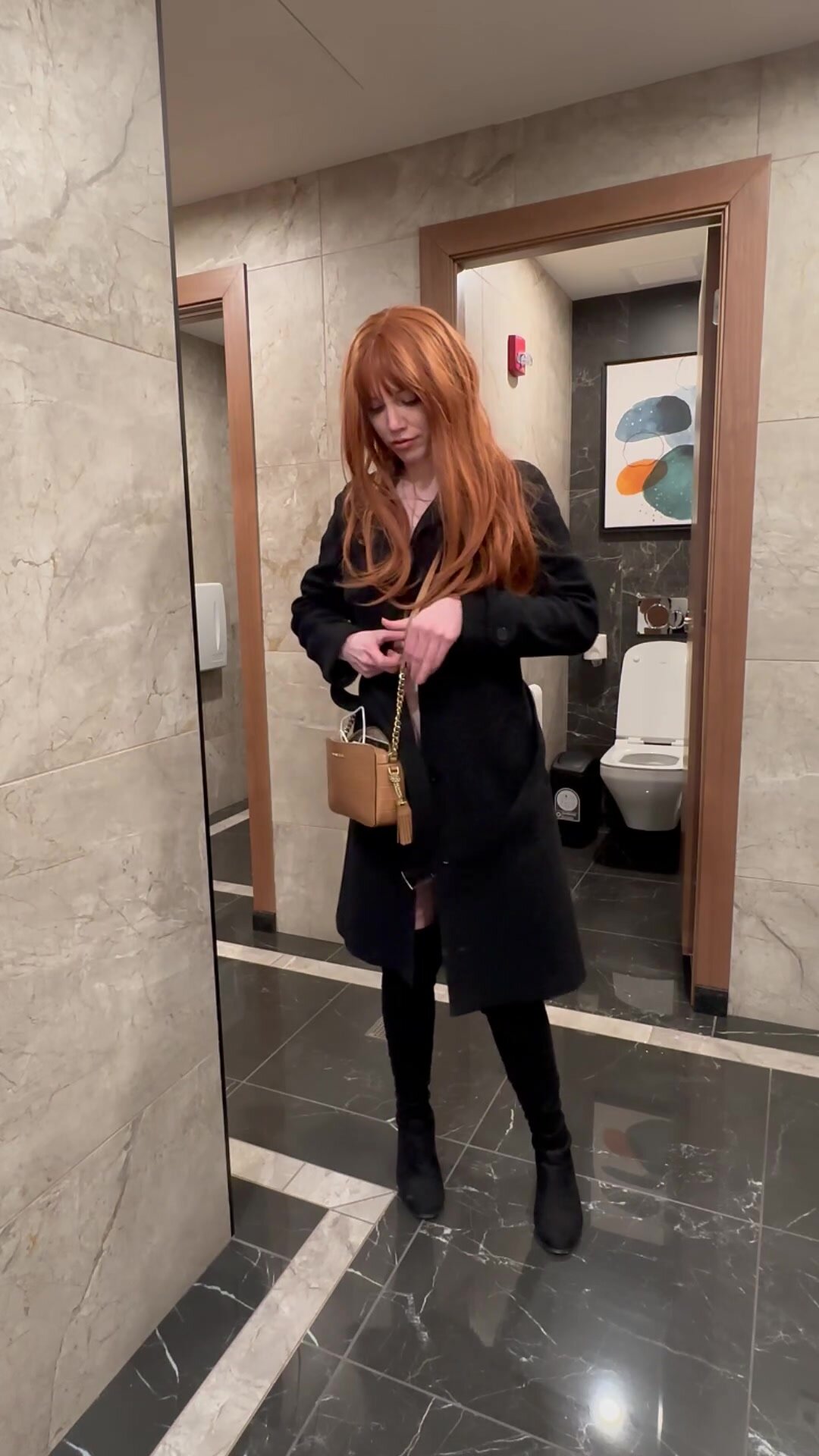 Flashing in a public bathroom. Ready to fuck anytime