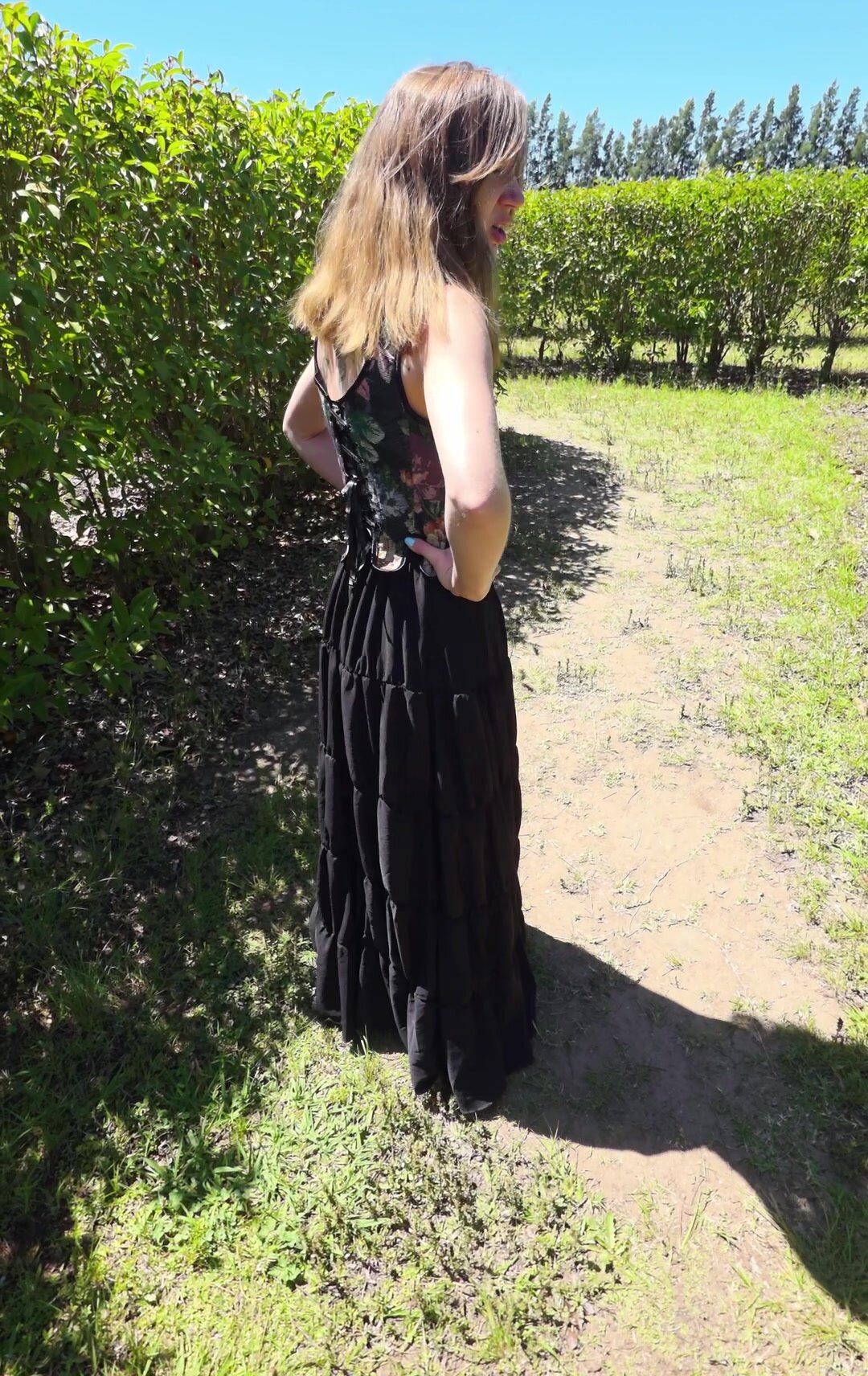 Peeing outdoors in public while exploring a maze