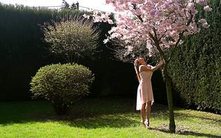 Dazzling Angel Piaff meets her lover under blossoming cherry tree