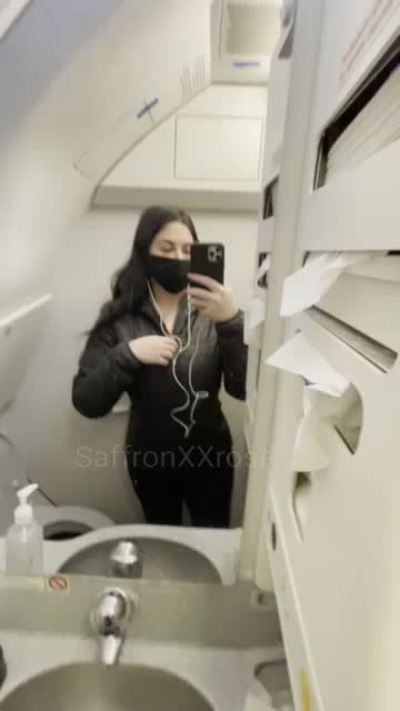 Does airplane bathroom count as a public place? GIF