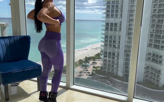 Sex fitness model with a gorgeous view from the window.