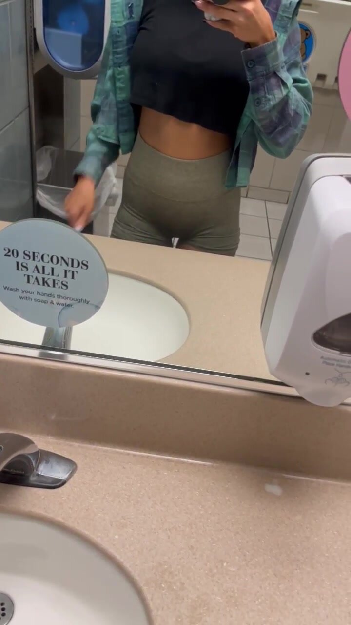 Pulling my tits out at the mall bathroom. Wonder if the woman in the stall watched me through the cracks